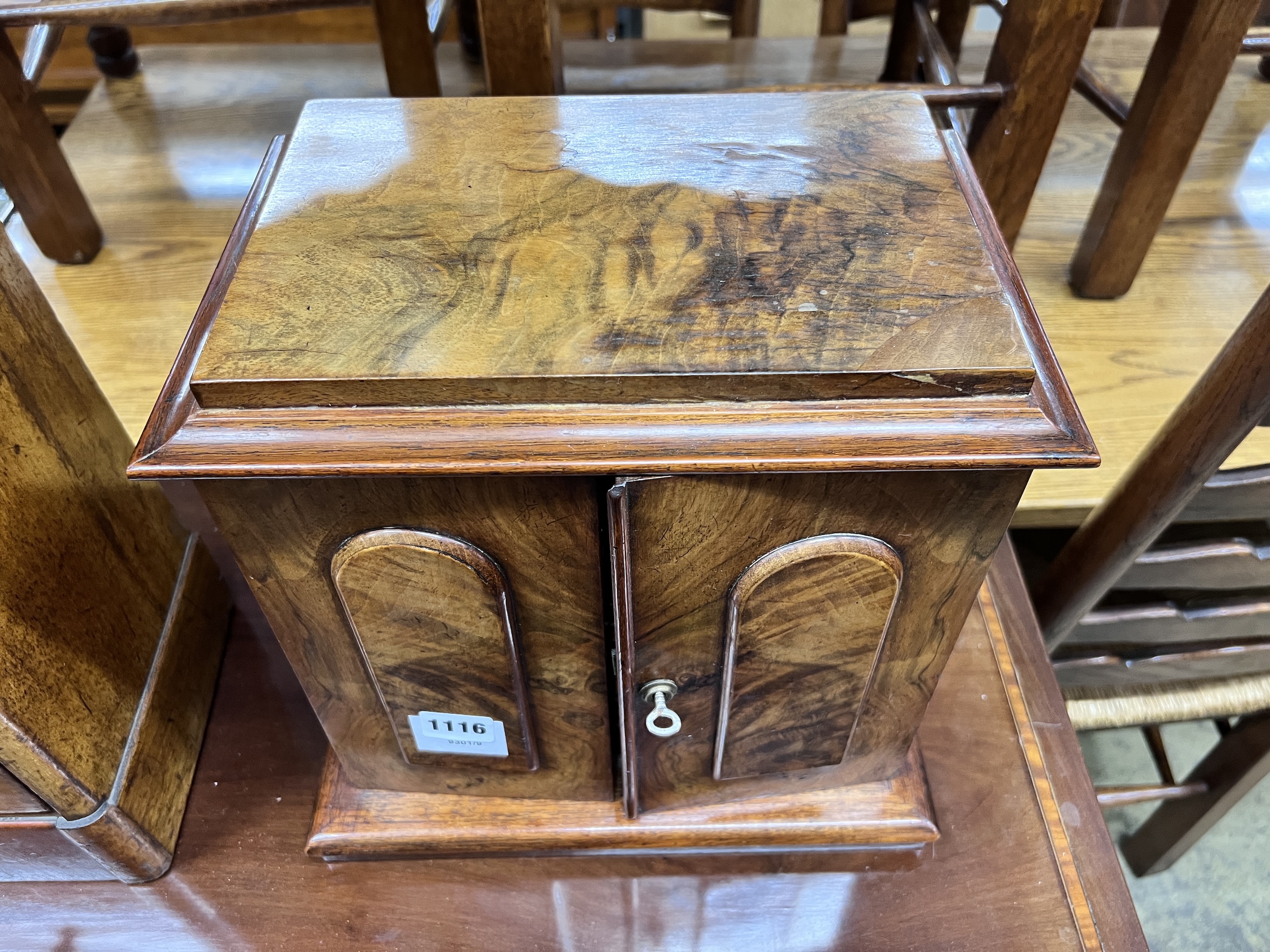 A Victorian figured walnut table cabinet fitted three drawers, width 32cm